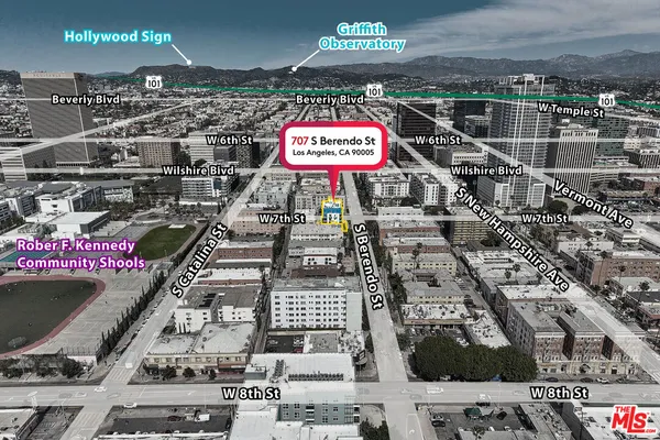 a view of a building with a street