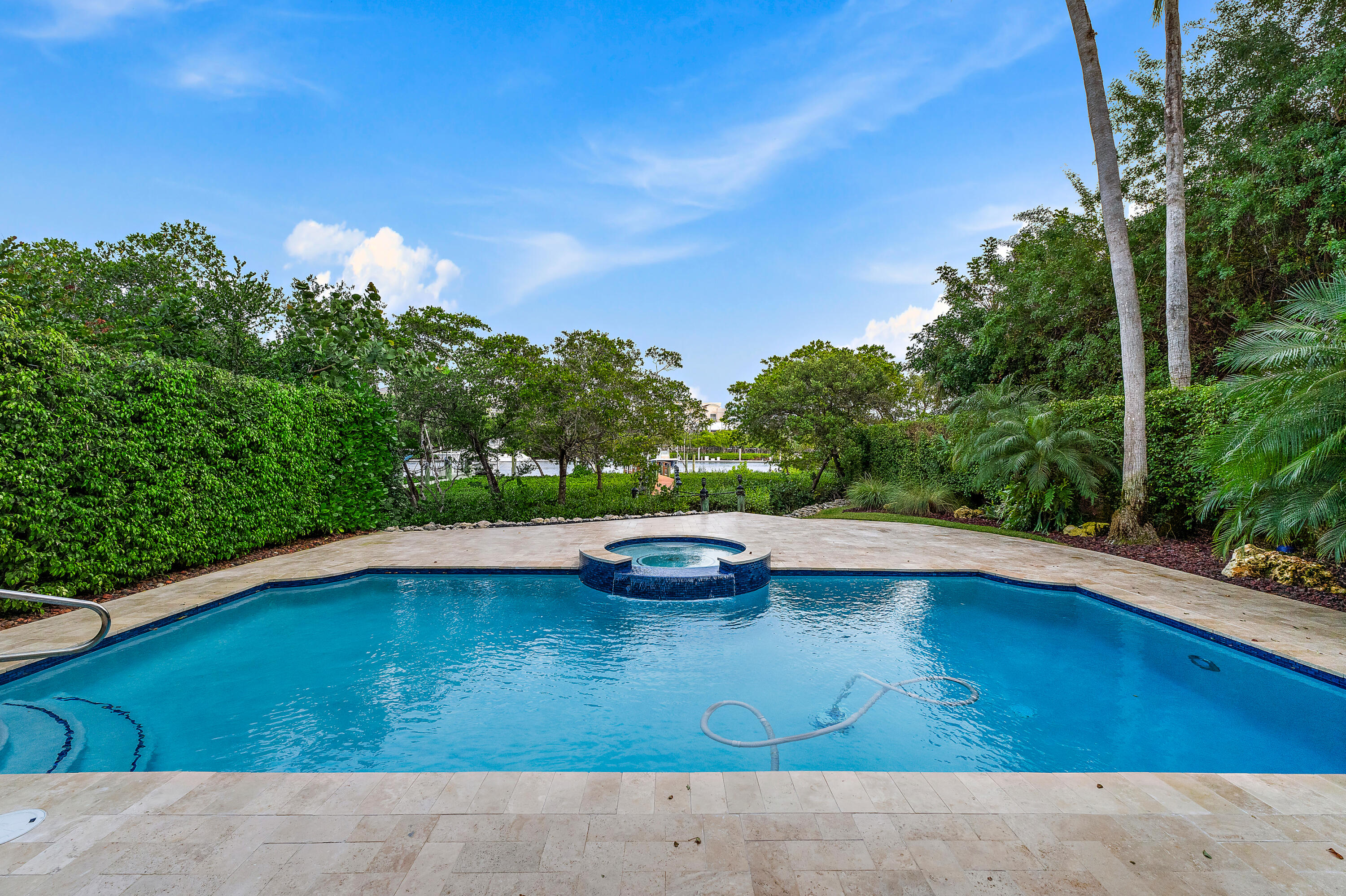 111 Fishermans Way Jupiter, FL 33477 - Photo 21 of 57 a view of swimming pool from a yard