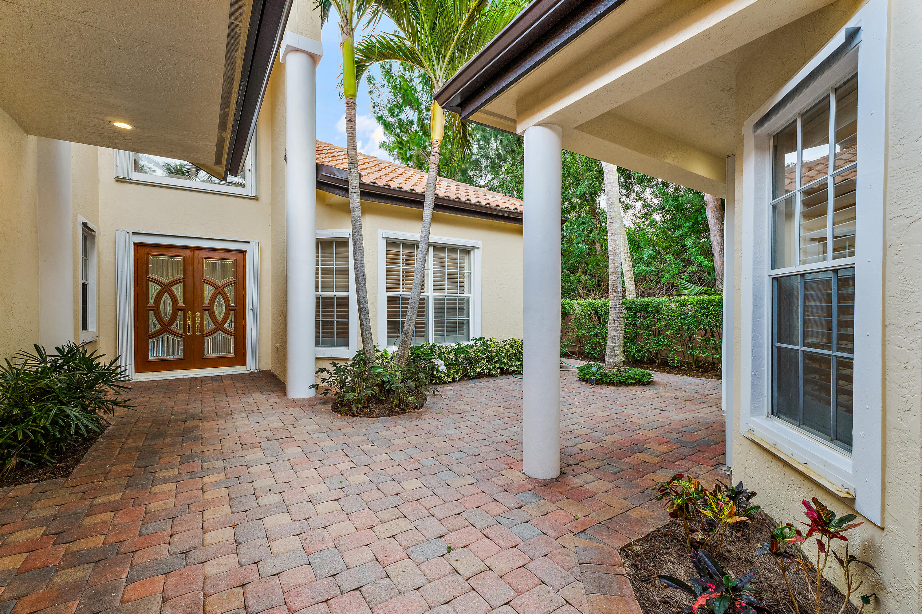 111 Fishermans Way Jupiter, FL 33477 - Photo 9 of 57 a view of a house with flower plants