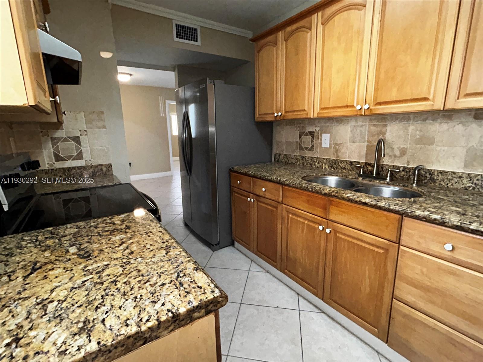 6091 West 22nd Court, Unit 101 Hialeah, FL 33016 - Photo 6 of 15 Lots of cabinet space!