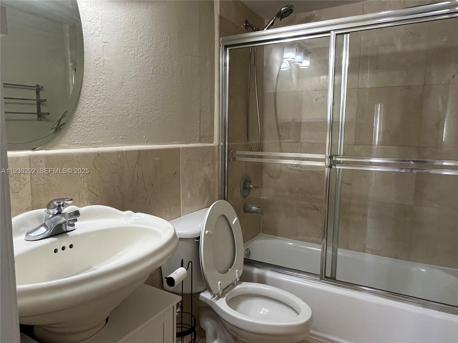 6091 West 22nd Court, Unit 101 Hialeah, FL 33016 - Photo 8 of 15 En-Suite Bathroom