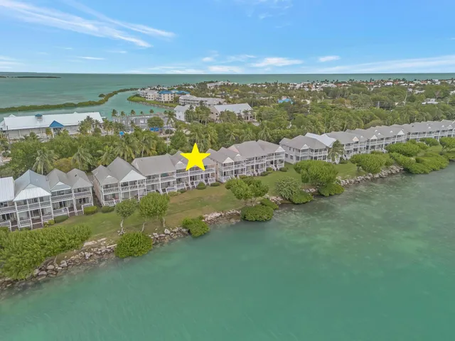 a view of a swimming pool with an outdoor space and seating area