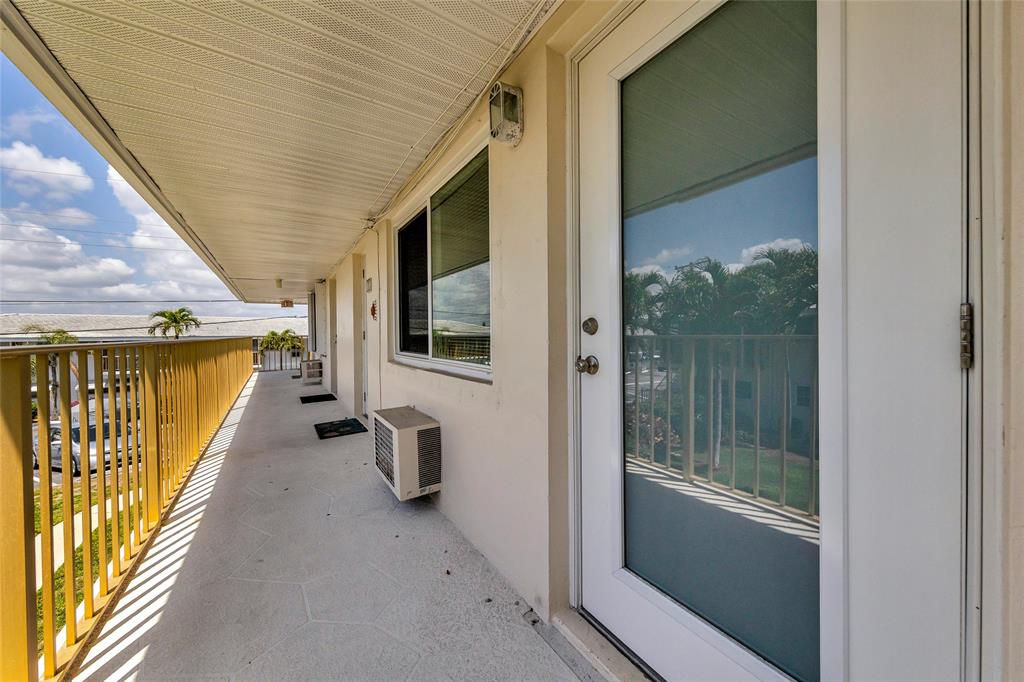 11 Southwest 4th Avenue, Unit 11 Boca Raton, FL 33432 - Photo 29 of 39 a view of a door and an entryway