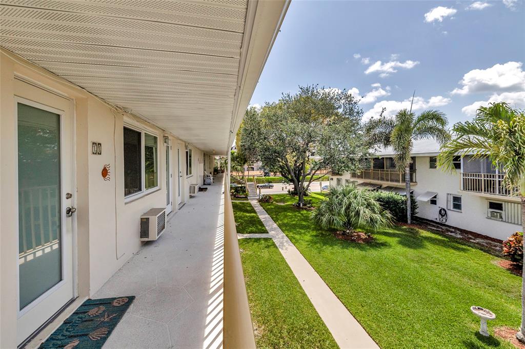 11 Southwest 4th Avenue, Unit 11 Boca Raton, FL 33432 - Photo 30 of 39 a house view with a garden space