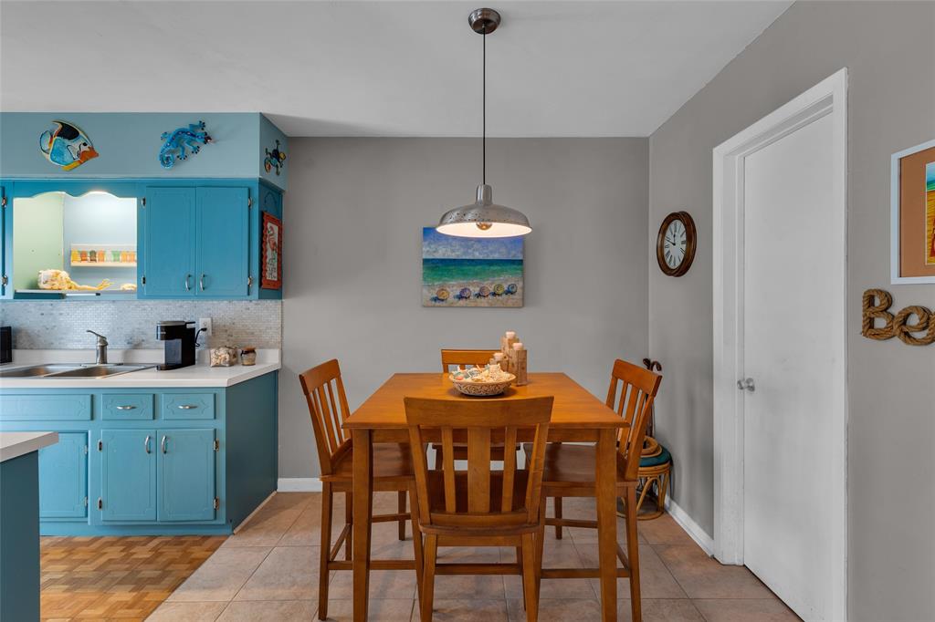 11 Southwest 4th Avenue, Unit 11 Boca Raton, FL 33432 - Photo 10 of 39 a dining room with furniture and window