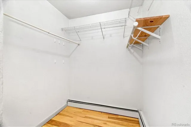 a view of a room with racks on the wall