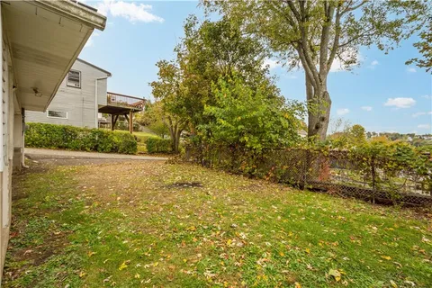 a view of a yard in front of a house