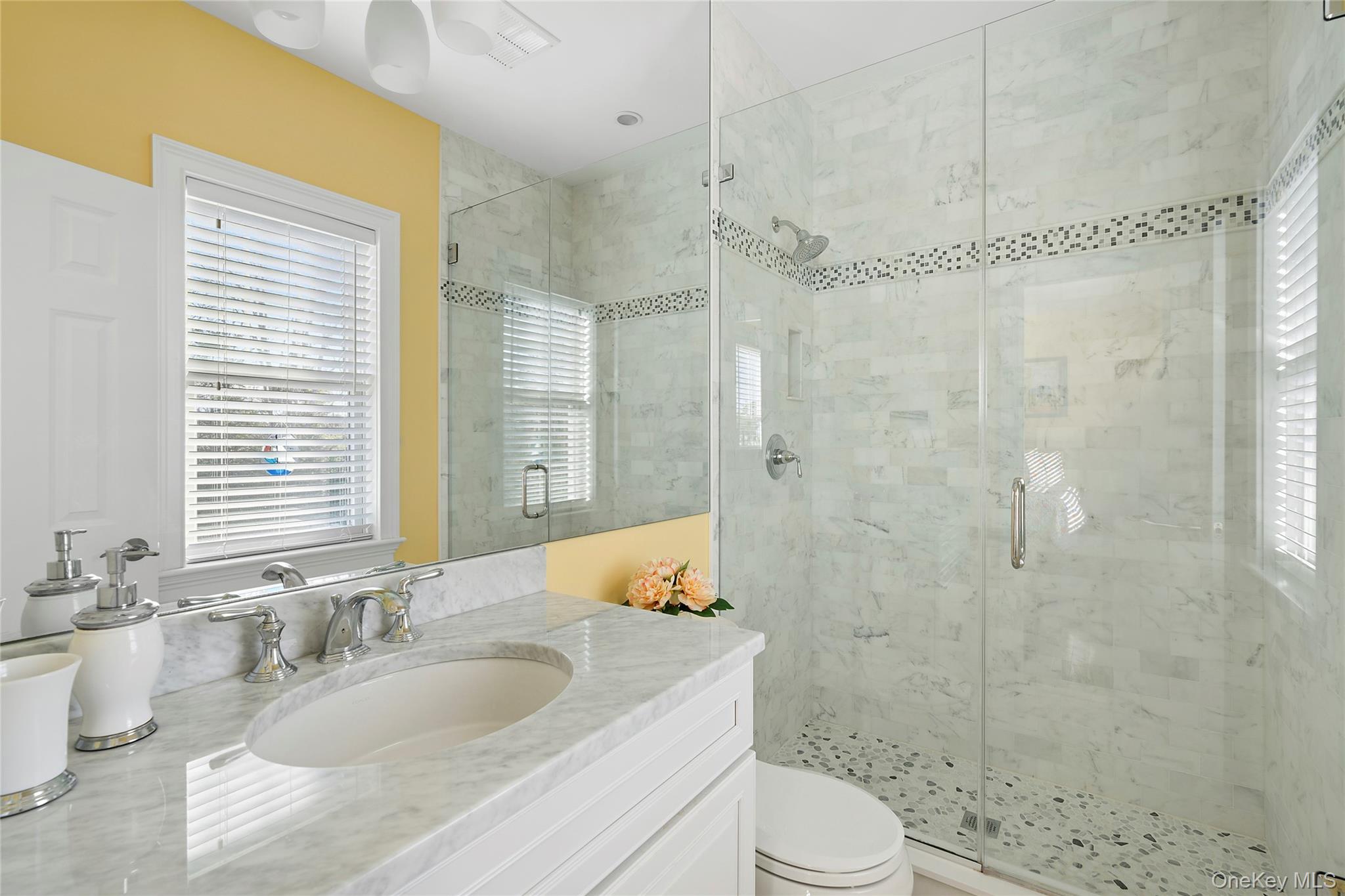 106 East Tiana Road Hampton Bays, NY 11946 - Photo 19 of 28 a bathroom with a granite countertop sink toilet and shower