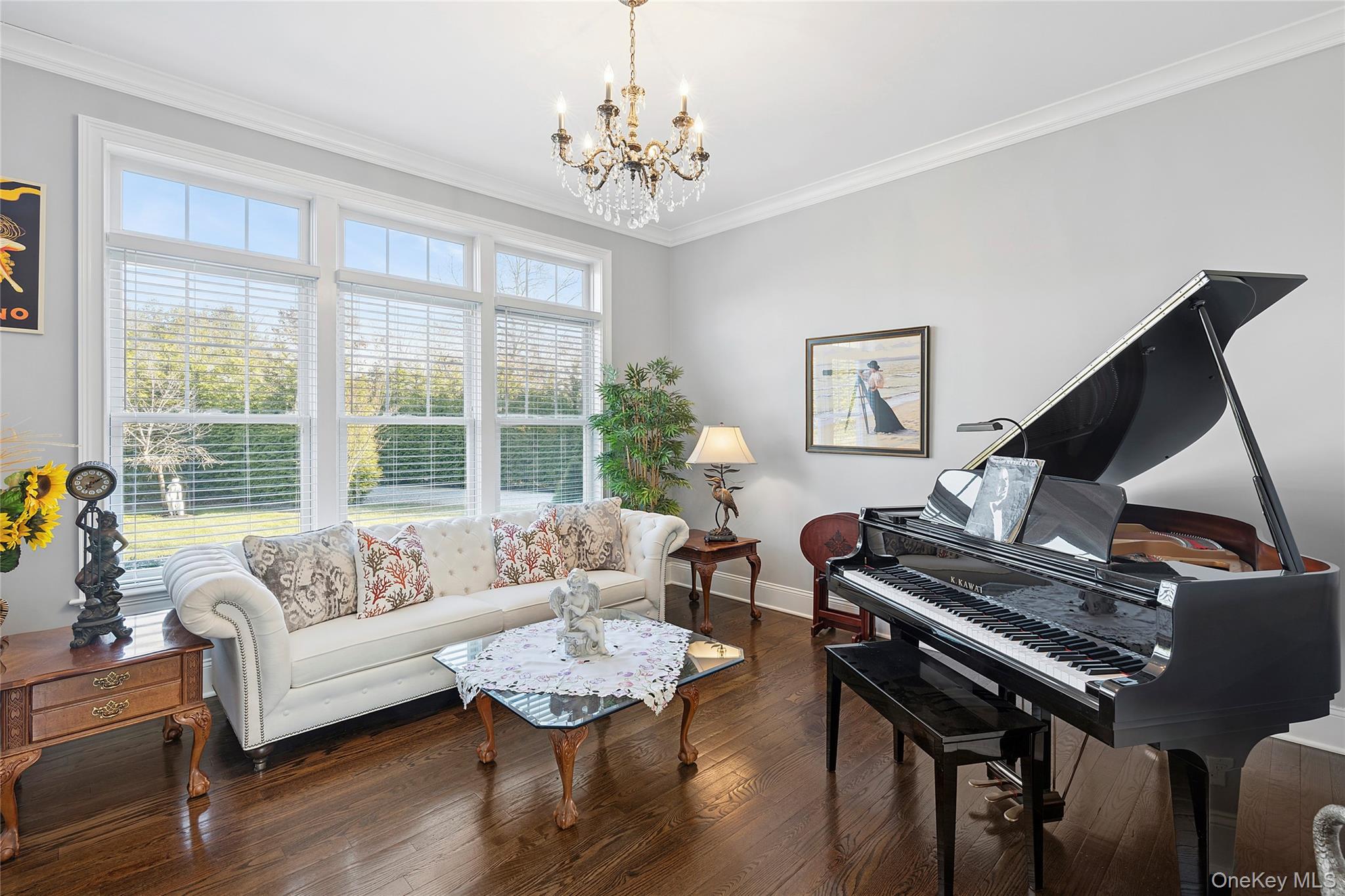 106 East Tiana Road Hampton Bays, NY 11946 - Photo 9 of 28 a living room with furniture and a piano