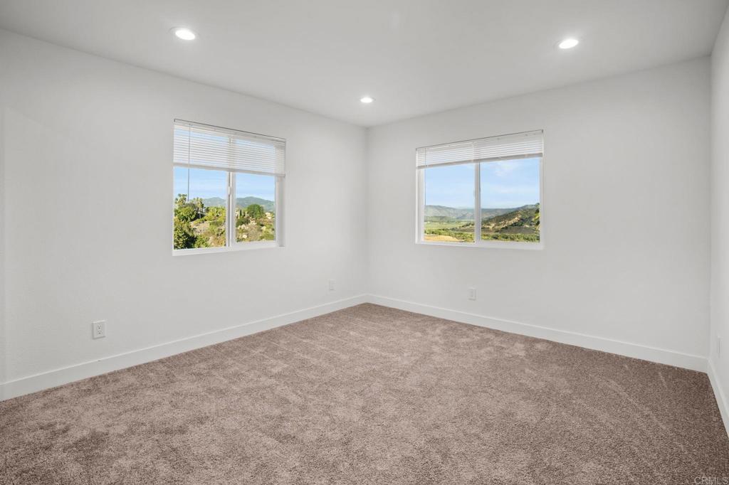 2918 Anaheim Street Escondido, CA 92025 - Photo 9 of 10 an empty room with windows