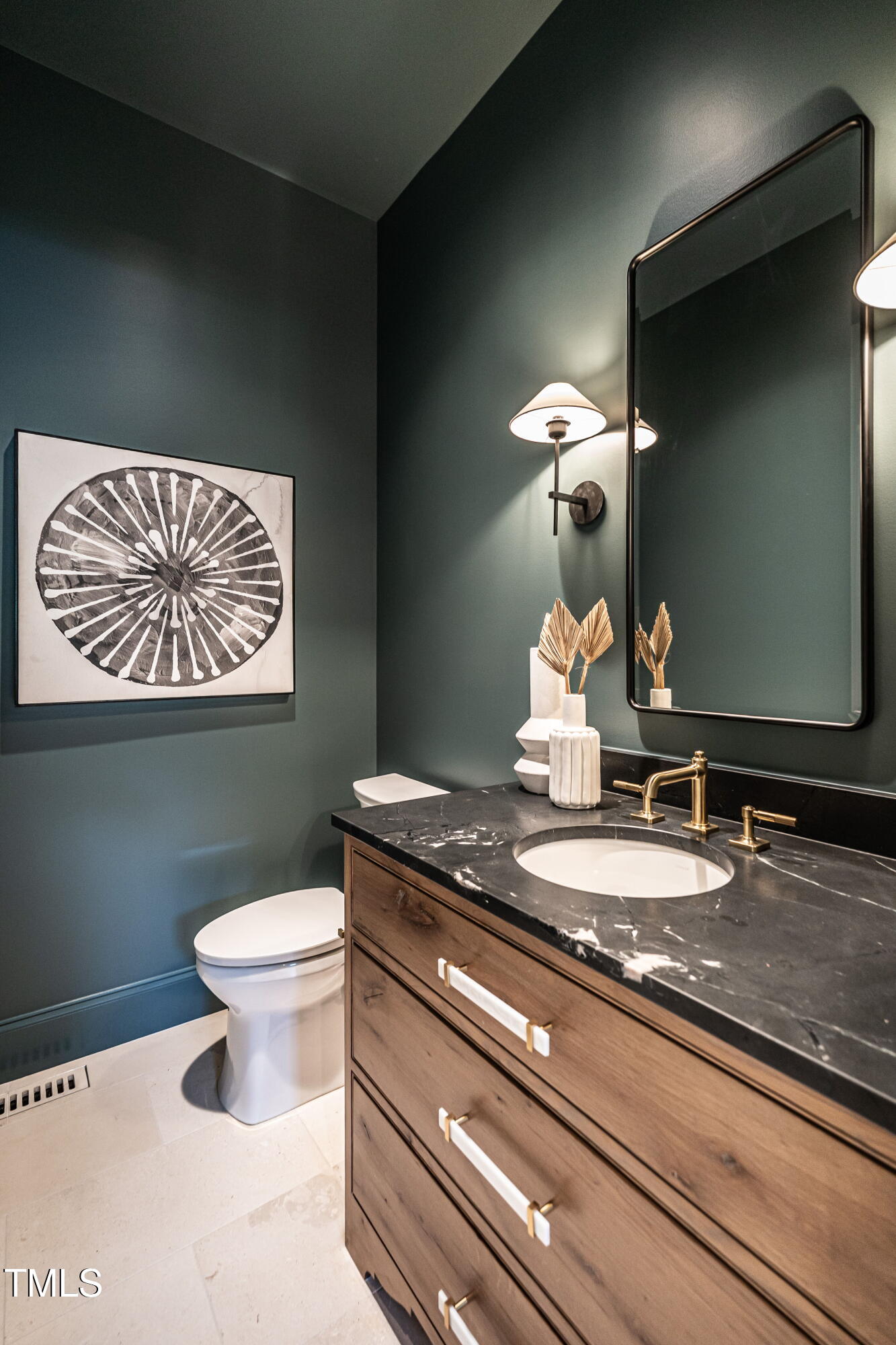 1222 Duplin Road Raleigh, NC 27607 - Photo 18 of 39 a bathroom with a toilet and a sink