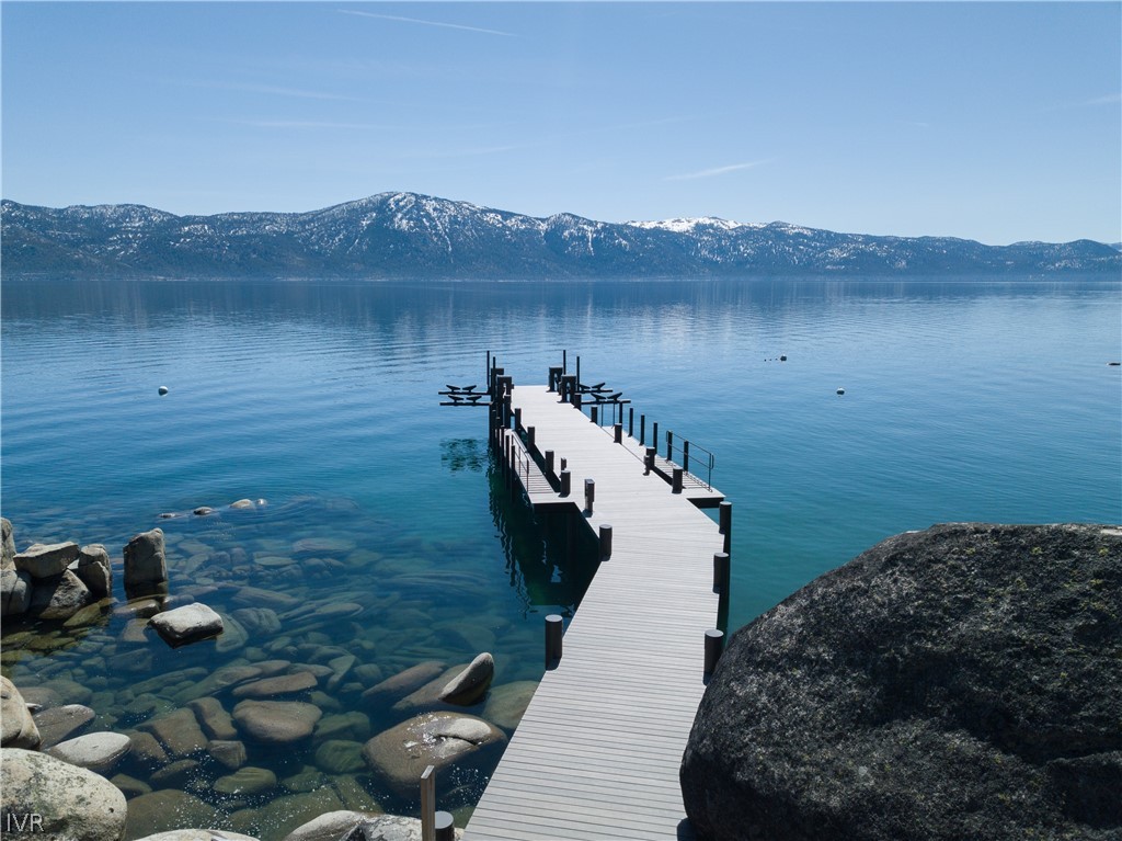 24 Crystal Drive Crystal Bay, NV 89402 - Photo 3 of 10 a view of a lake with a mountain in the background
