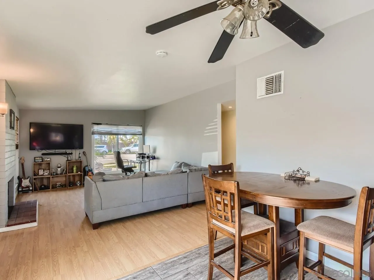 1401 9th Street Imperial Beach, CA 91932 - Photo 11 of 26 a living room with furniture and a flat screen tv