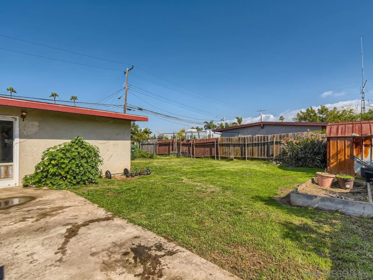 1401 9th Street Imperial Beach, CA 91932 - Photo 21 of 26 a view of a house with backyard and sitting area