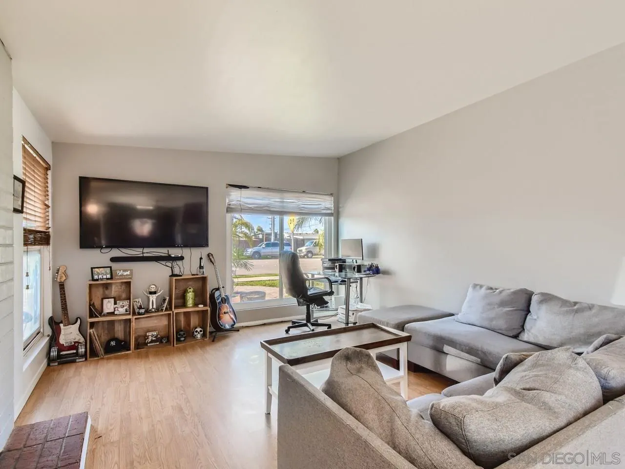 1401 9th Street Imperial Beach, CA 91932 - Photo 4 of 26 a living room with furniture and a flat screen tv