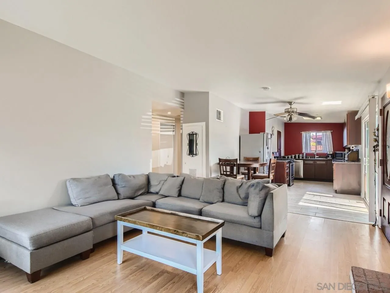 1401 9th Street Imperial Beach, CA 91932 - Photo 5 of 26 a living room with furniture and a wooden floor