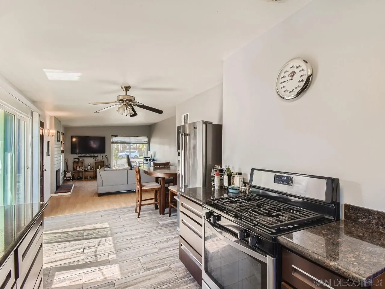 1401 9th Street Imperial Beach, CA 91932 - Photo 10 of 26 a kitchen with a stove and a chandelier
