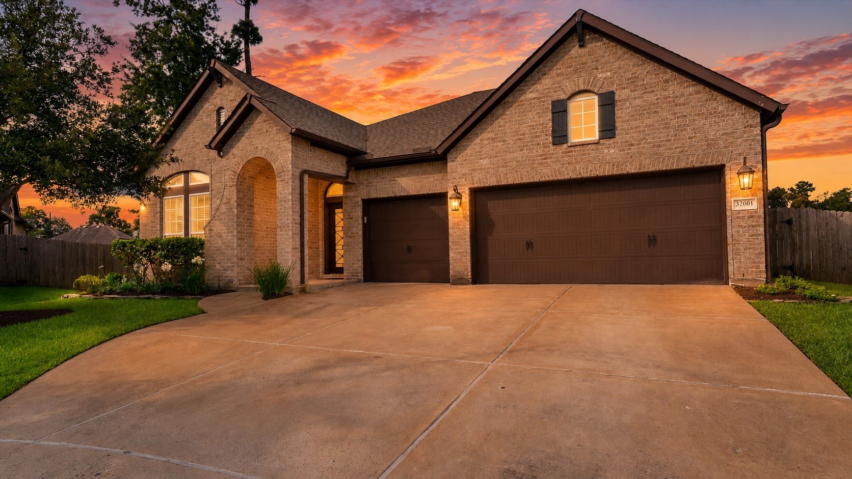 Stunning brick home with a 3-car garage, soaring entry, and beautiful sunset curb appeal in one of Spring's most desirable communities.