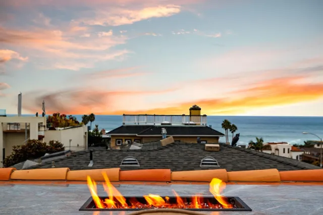 a view of a swimming pool with an ocean view