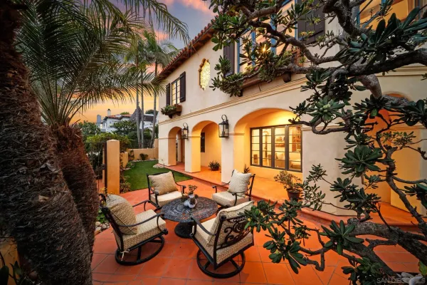 a view of a backyard with a patio