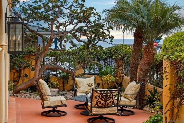 a spacious bedroom with a bed and a table