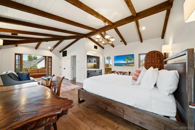 a room with furniture and a flat screen tv