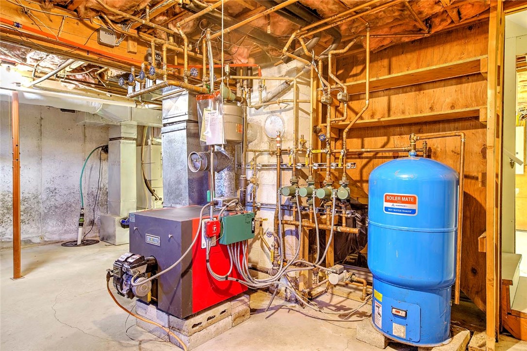 534 Curtis Corner Road South Kingstown, RI 02879 - Photo 29 of 38 Clean Basement with Well-Maintained Boiler and HVAC equipment.