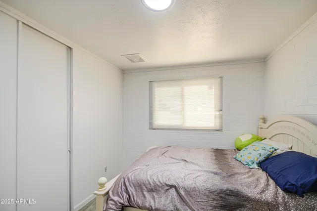 a view of a livingroom with furniture and toys
