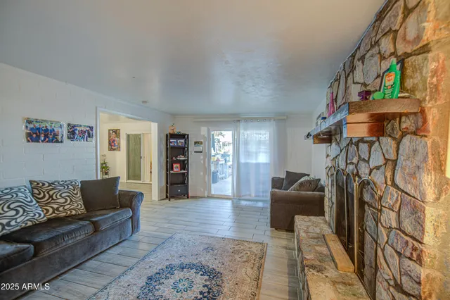 a living room with furniture and a couch