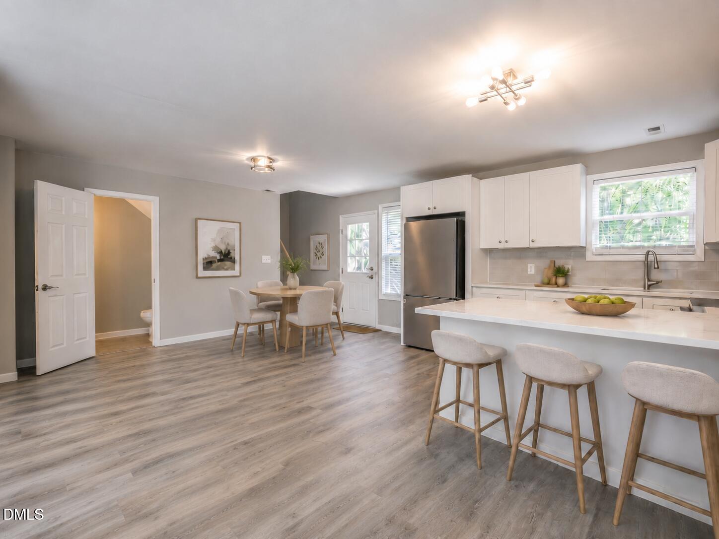 255 Erwin Road, Unit A Chapel Hill, NC 27514 - Photo 6 of 16 a living room with furniture and a wooden floor