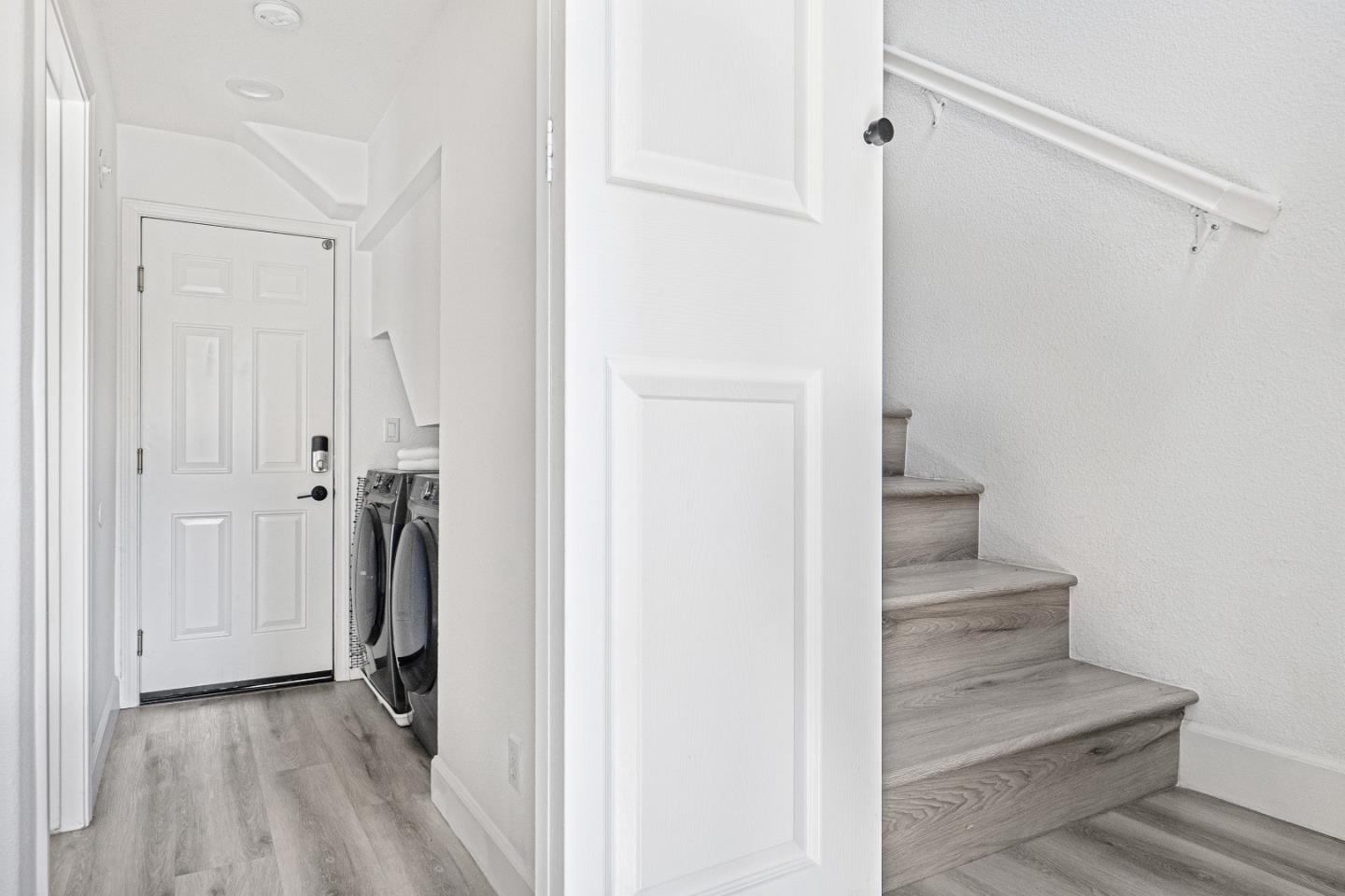 827 Harmony Place Milpitas, CA 95035 - Photo 19 of 36 a view of a hallway with wooden floor and entryway
