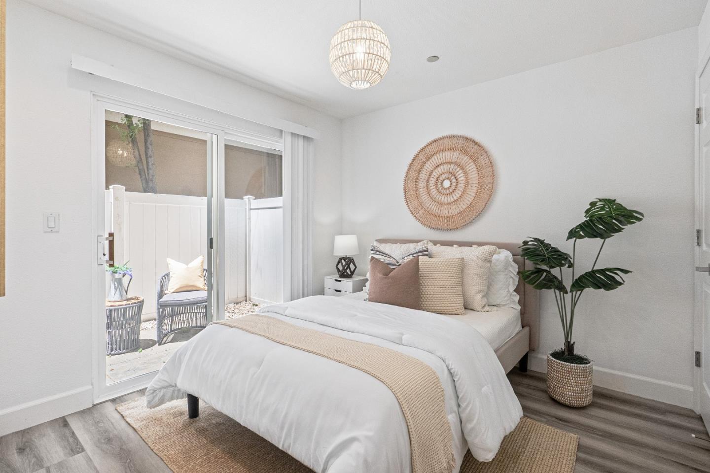 827 Harmony Place Milpitas, CA 95035 - Photo 21 of 36 a bedroom with a bed and a window