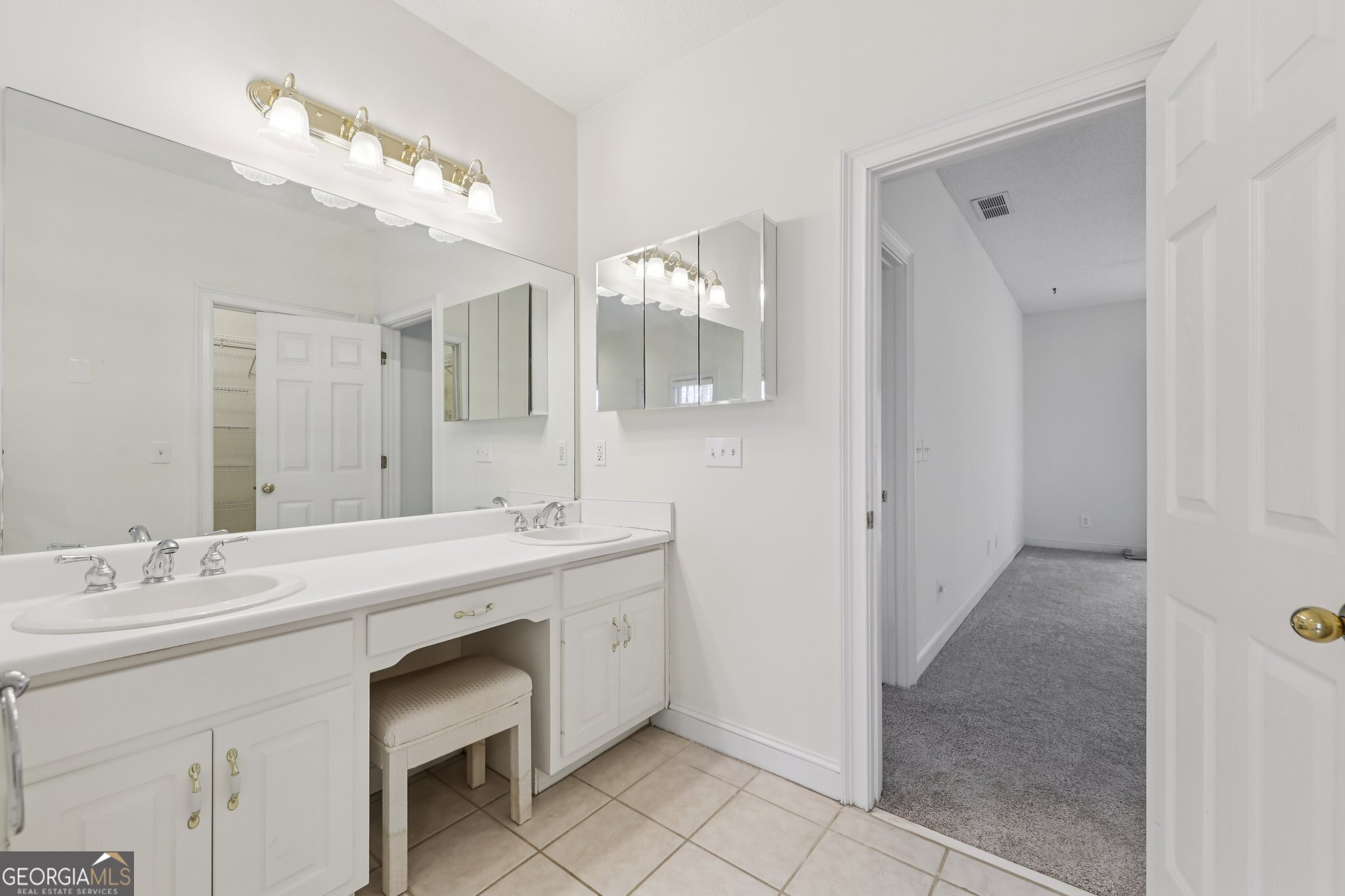 378 Pierce Chapel Road Newnan, GA 30263 - Photo 30 of 66 a spacious bathroom with a double vanity sink mirror and