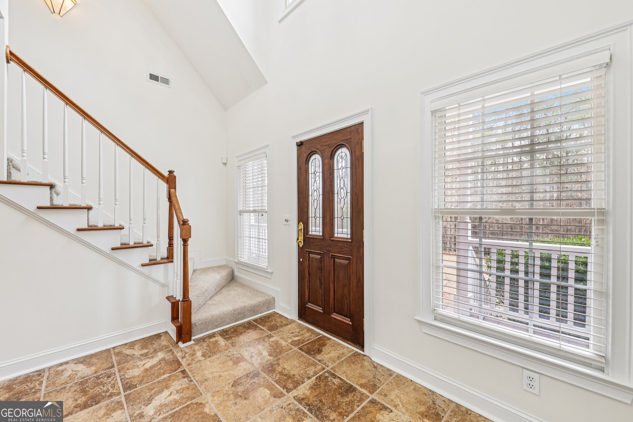 378 Pierce Chapel Road Newnan, GA 30263 - Photo 10 of 66 a view of entryway with wooden floor and stairs