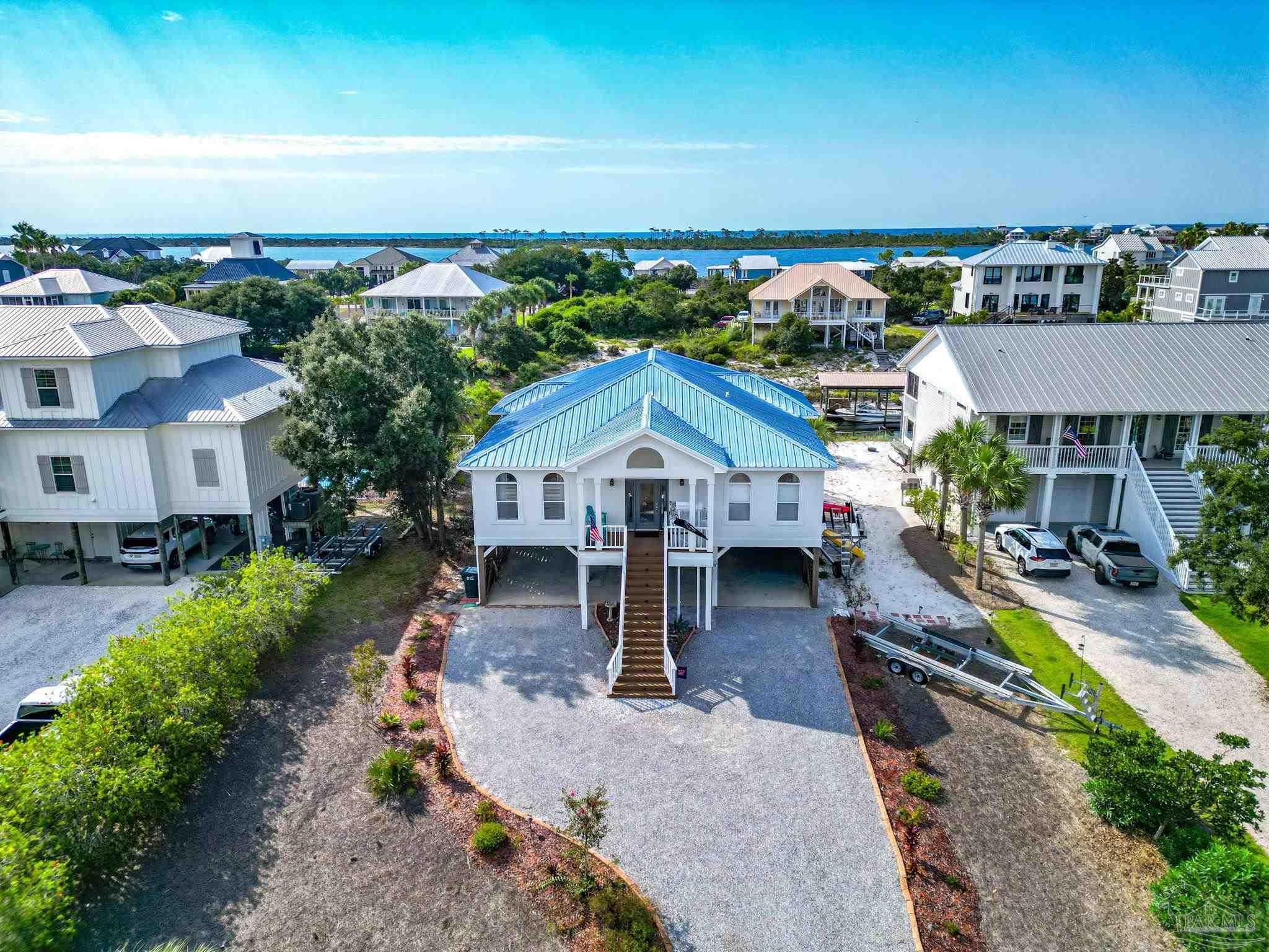an aerial view of a house with a garden view