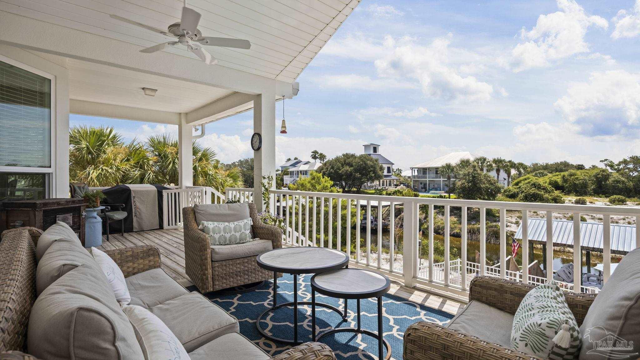 32580 Sandpiper Drive Orange Beach, AL 36561 - Photo 33 of 52 a balcony with furniture