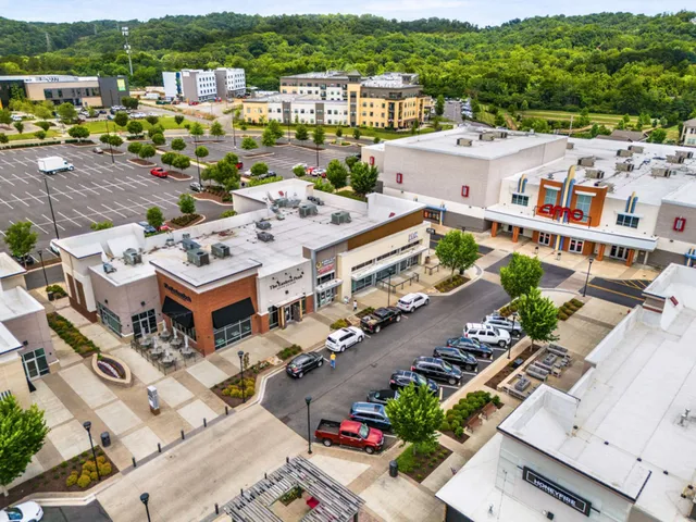 an aerial view of a city with streets and houses