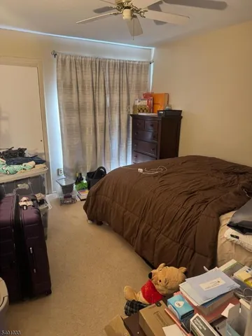 a room with a chair and gym equipment