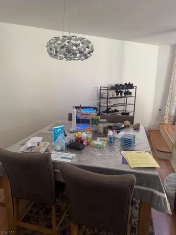 a kitchen with a window a sink and a table