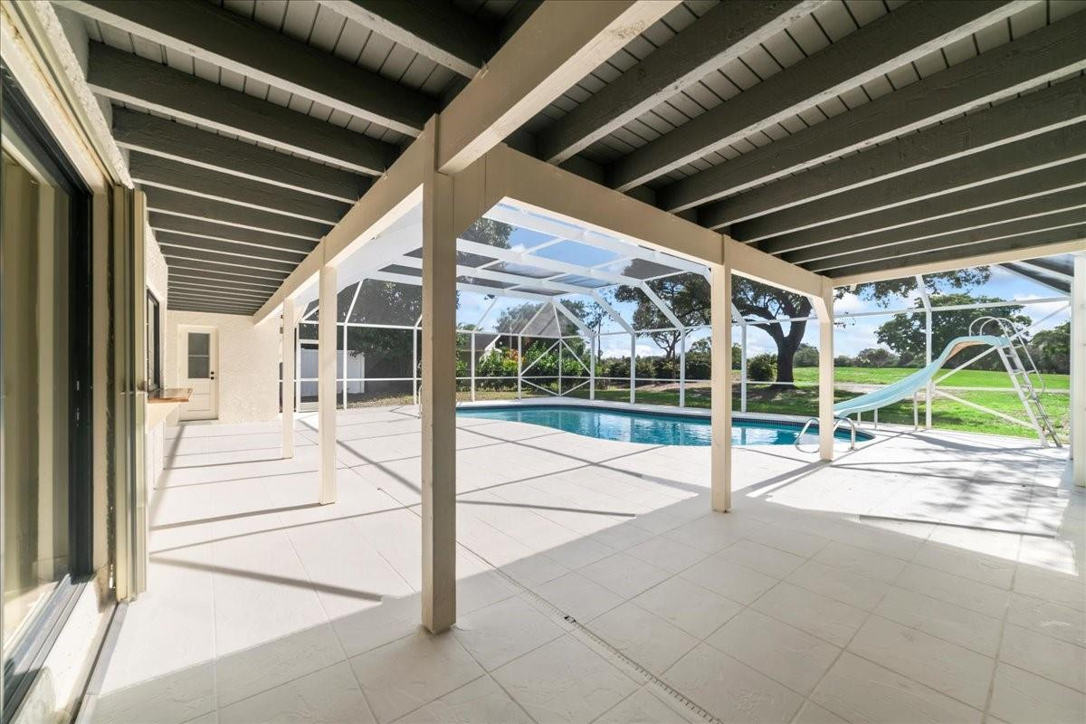 8600 Gatehouse Road Plantation, FL 33324 - Photo 15 of 27 a view of a pathway with a backyard