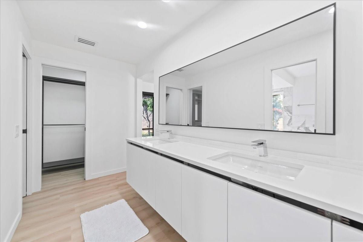8600 Gatehouse Road Plantation, FL 33324 - Photo 22 of 27 a bathroom with a sink and a mirror