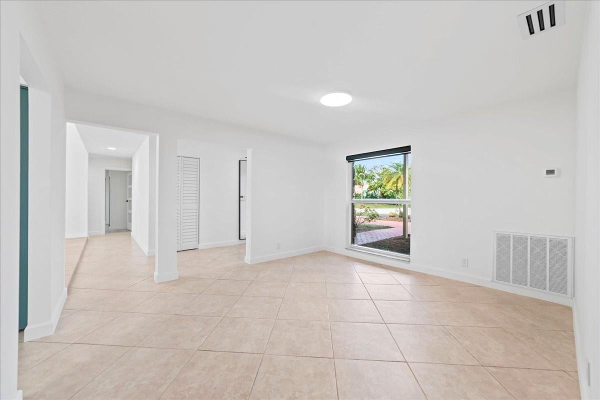 8600 Gatehouse Road Plantation, FL 33324 - Photo 8 of 27 a view of an empty room with a window