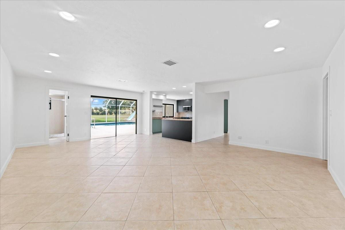 8600 Gatehouse Road Plantation, FL 33324 - Photo 9 of 27 a view of an empty room with a window