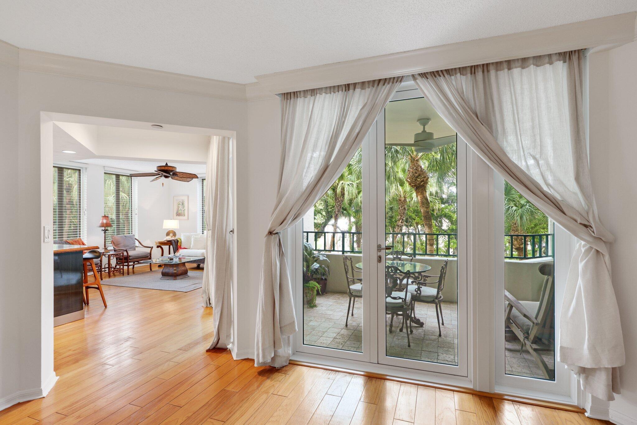 100 Southeast 5th Avenue, Unit 308 Boca Raton, FL 33432 - Photo 14 of 49 a living room with furniture and a large window