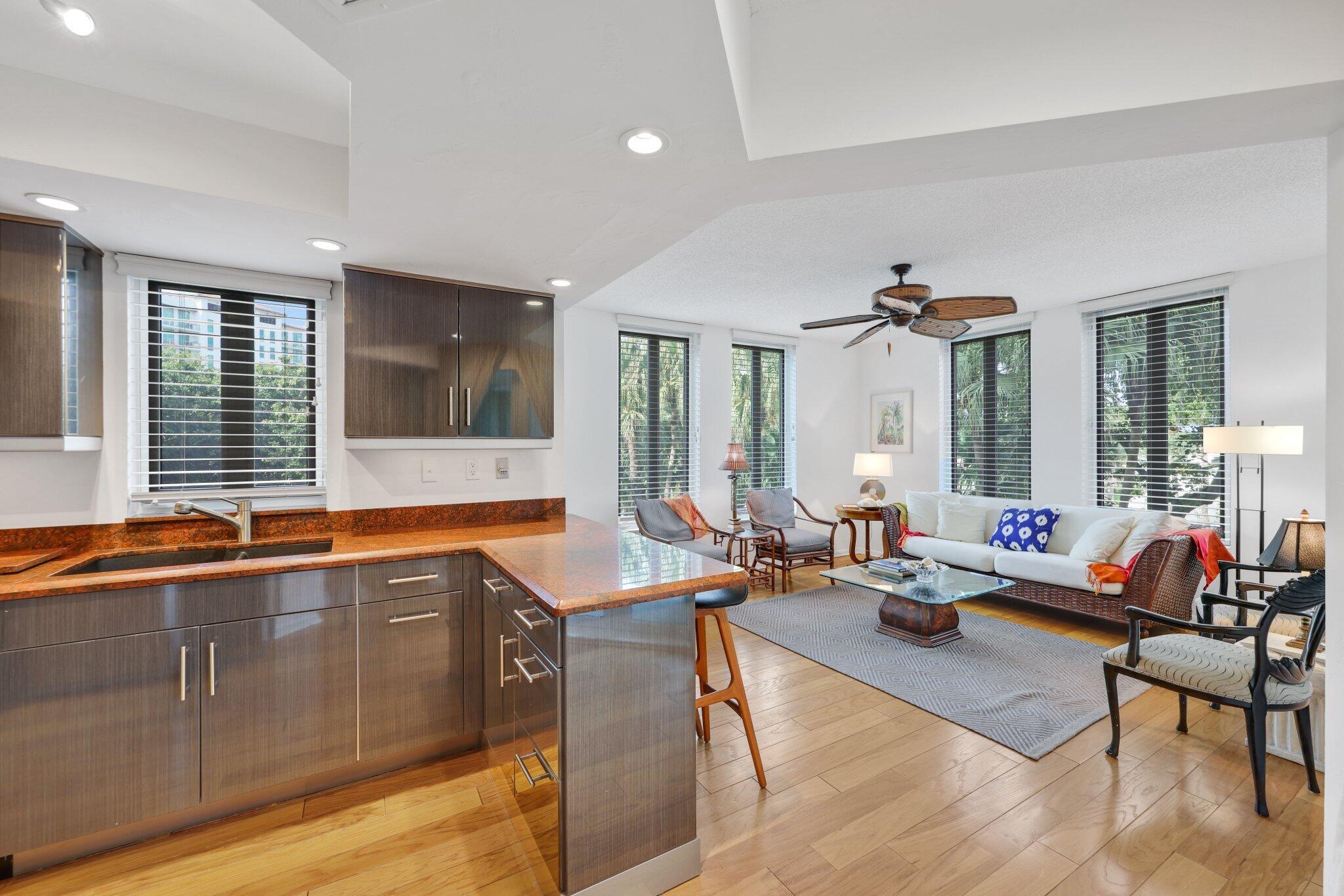 100 Southeast 5th Avenue, Unit 308 Boca Raton, FL 33432 - Photo 21 of 49 a living room with furniture window and wooden floor
