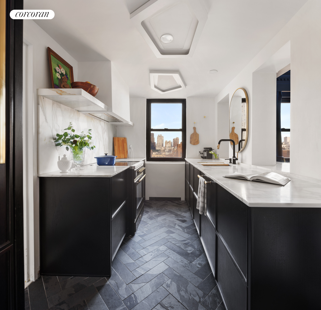 175 East 62nd Street, Unit PHA Manhattan, NY 10065 - Photo 7 of 17 a kitchen with a sink and stove top oven