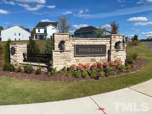 1622 Emory Ridge Way, Unit 22 Wake Forest, NC 27587 - Photo 3 of 24 a sign on the side of the building