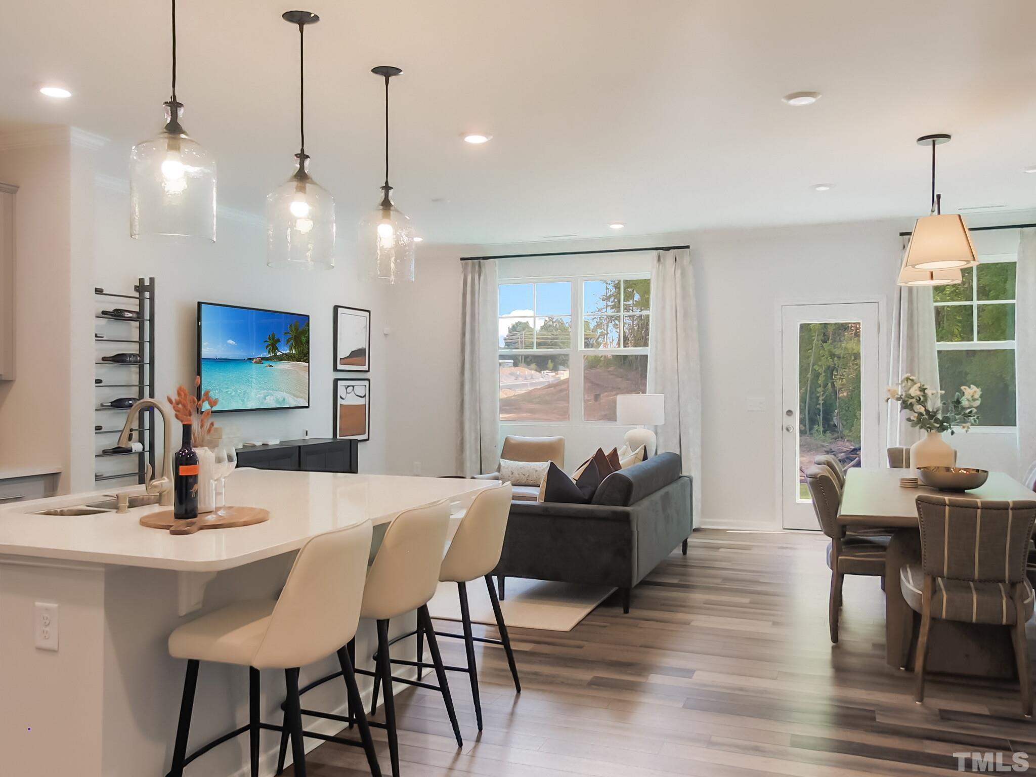 1622 Emory Ridge Way, Unit 22 Wake Forest, NC 27587 - Photo 7 of 24 a view of a dining room with furniture window and outside view