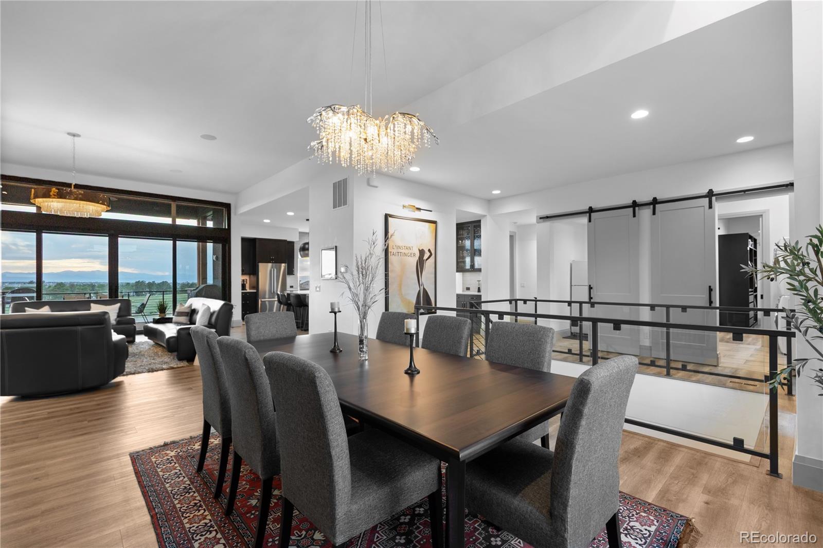 10689 Shadow Pines Road Parker, CO 80138 - Photo 7 of 50 a view of a dining room with furniture