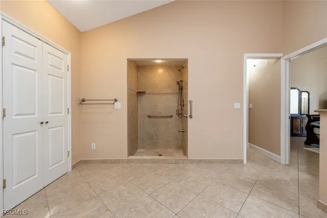 an empty room with closet area